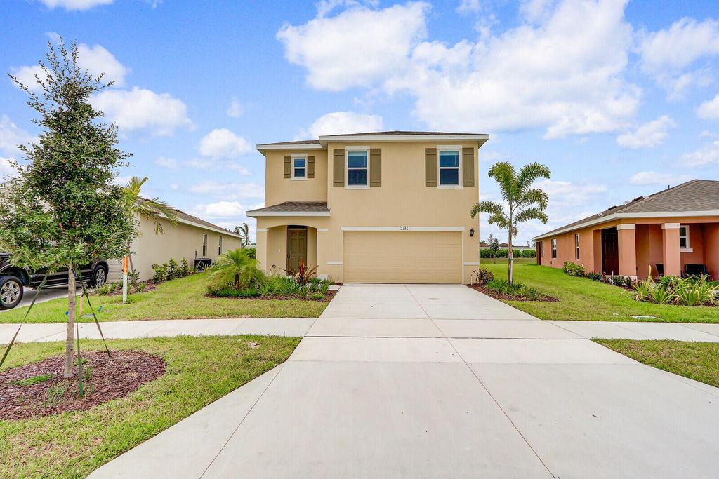 Photo of 12356 SW Rimini Way, Port St Lucie, FL 34987 (MLS # R11004371)