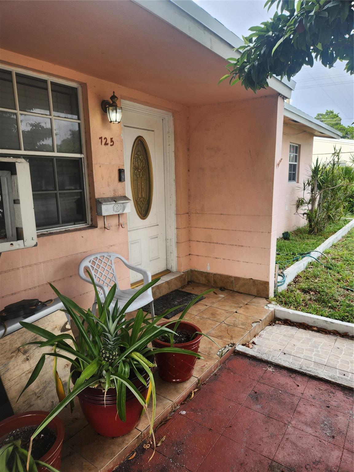 725 NW 199th St