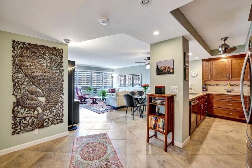 Move IN READY. This significantly remodeled 2 bedroom beauty offers sweeping views of the ocean, pool and 5 surrounding acres. Immerse yourself in the serenity of the sea and the allure of a crystal-clear pool from the comfort of your own living space. Entertaining is more fun with this Chef's kitchen featuring all LG appliances, granite counter tops, soft close wood cabinetry and a snack counter. The bedrooms are equipped with California closets, ensuring both style and organization. Indulge in the convenience of a huge walk-in closet, providing ample storage space for your wardrobe. Building is A+ insurance rated, physically and financially sound, all work completed and paid for. Internet & cable included in maintenance. 55+ community, cash only, no renting.