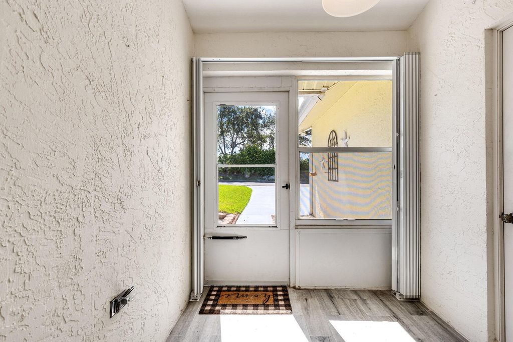 Photo of 11036 SE Sea Pines Circle, Hobe Sound, FL 33455 (MLS # R11131520)