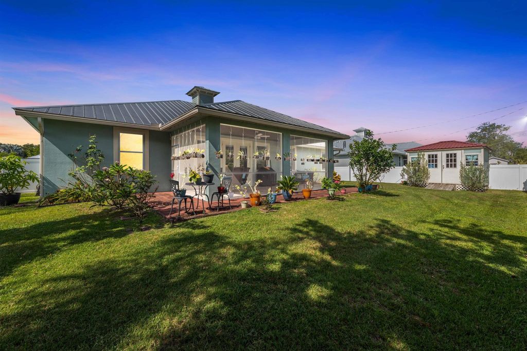 Photo of 699 SE Crescent Avenue, Port Saint Lucie, FL 34984 (MLS # R10993803)