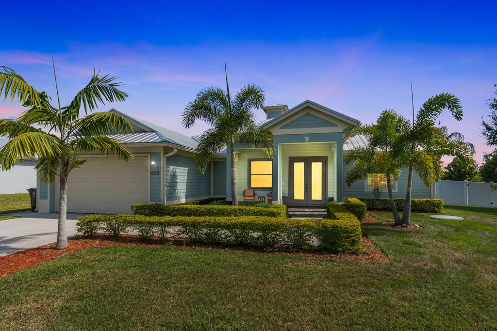 Photo of 699 SE Crescent Avenue, Port Saint Lucie, FL 34984 (MLS # R10993803)