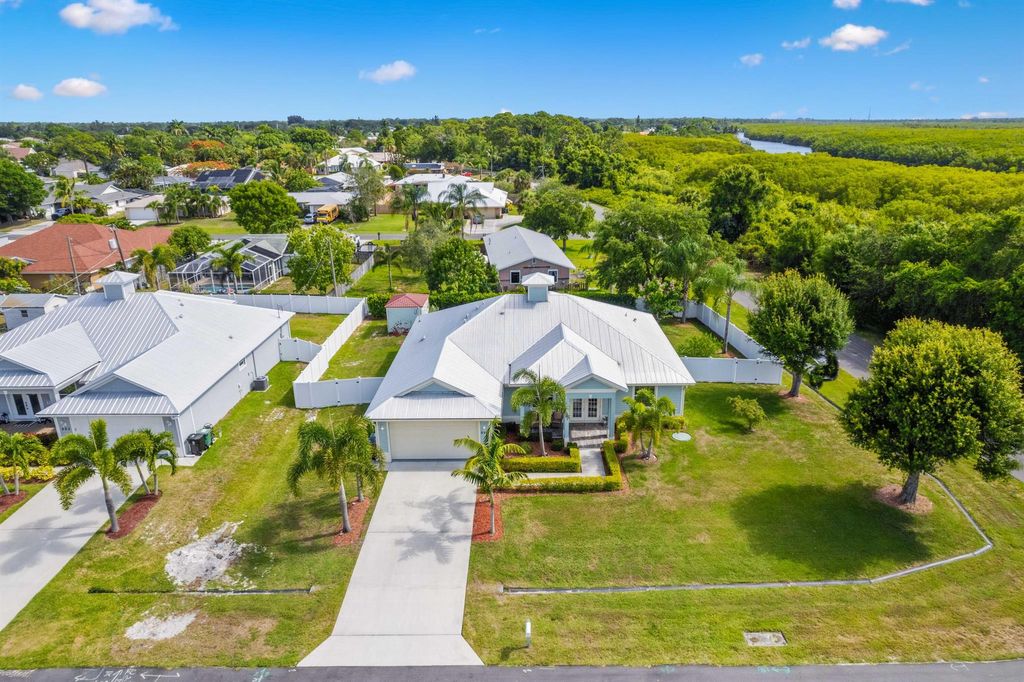 Photo of 699 SE Crescent Avenue, Port Saint Lucie, FL 34984 (MLS # R10993803)