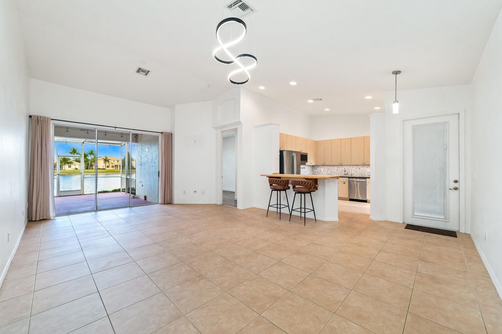 Photo of 8597 Mangrove Cay, West Palm Beach, FL 33411 (MLS # R11159844)