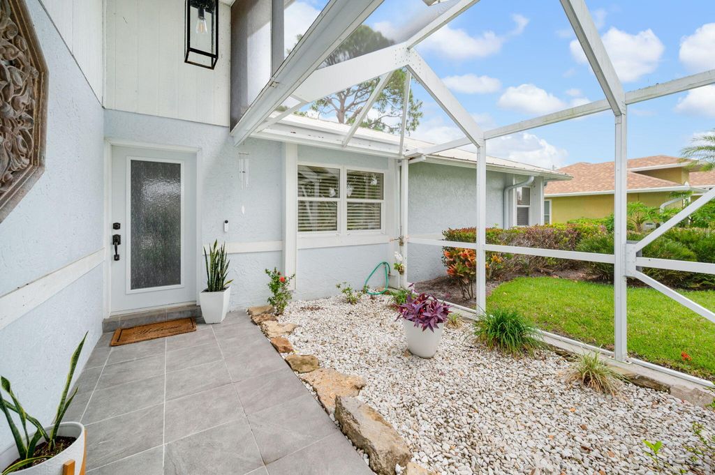 Photo of 265 SE Todd Avenue, Port Saint Lucie, FL 34983 (MLS # B26027850)