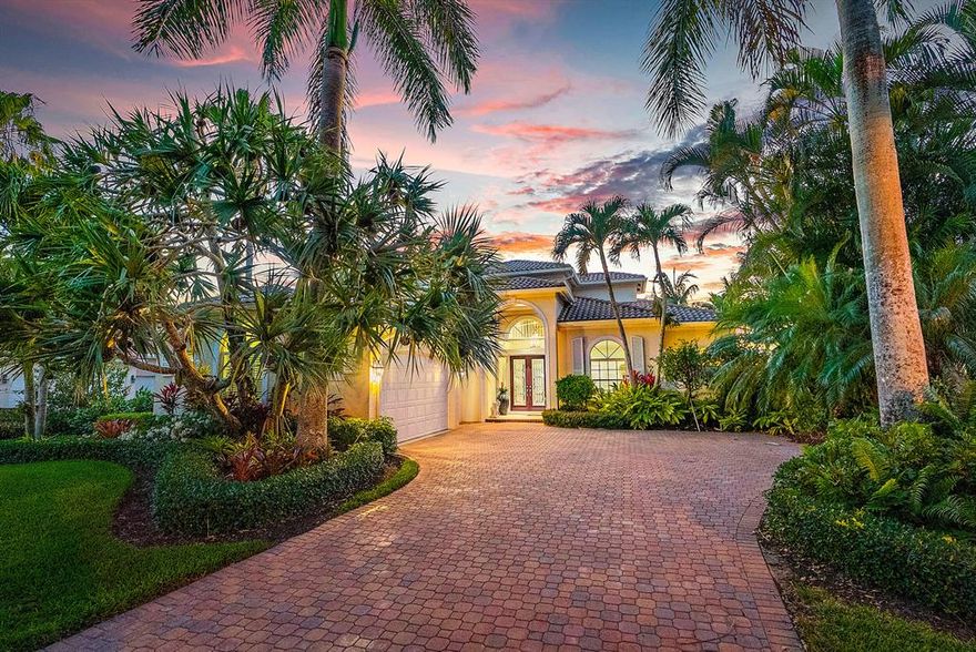 Stunning 2-story Admirals Cove home with panoramic lake and golf views. Walk inside to a bright and open space with soaring volume ceilings and picturesque windows showcasing the panoramic lake and golf views. 5 bedrooms and 4.5 baths with 3,948 living square feet. An updated chefs kitchen that's sure to impress the fussiest of buyers, featuring custom wood cabinets, built-in desk, wine fridge, high-end granite countertop and snack bar. Travertine marble and hardwood floors downstairs. Walk up the gallery staircase to a loft and two spacious bedrooms (one with a covered balcony that overlooks the pool and has spectacular views of the lake and golf course) with ensuite bathrooms.