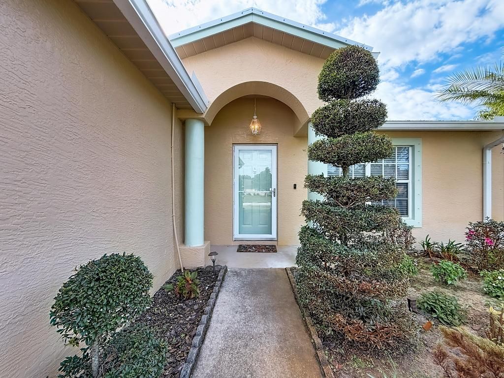 Photo of 2038 SW Libra Lane, Port Saint Lucie, FL 34984 (MLS # R11157344)
