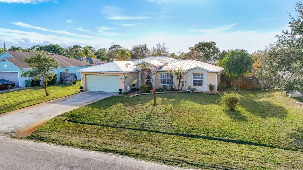 Photo of 2038 SW Libra Lane, Port Saint Lucie, FL 34984 (MLS # R11157344)