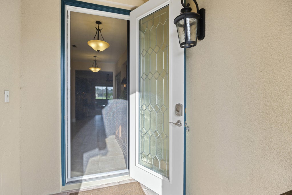 Photo of 9658 SW Royal Poinciana Drive, Port Saint Lucie, FL 34987 (MLS # R11036742)