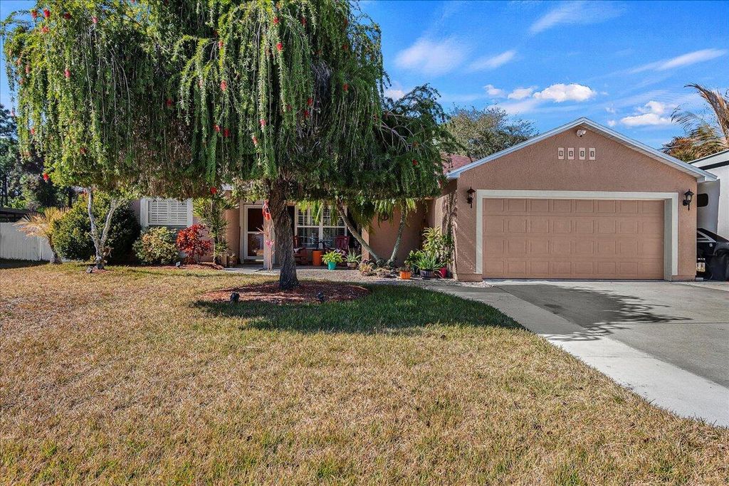 Photo of 1960 SE Bowie Street, Port Saint Lucie, FL 34952 (MLS # R11163650)