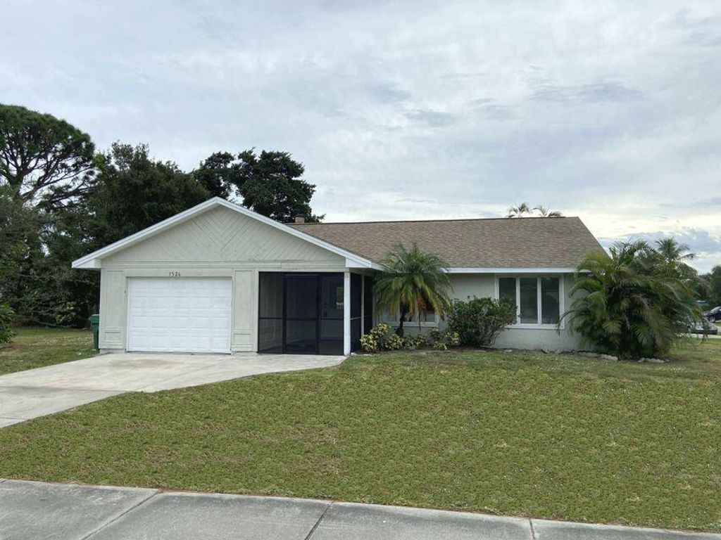 Photo of 1526 SE Port St Lucie Boulevard, Port Saint Lucie, FL 34953 (MLS # R10762114)