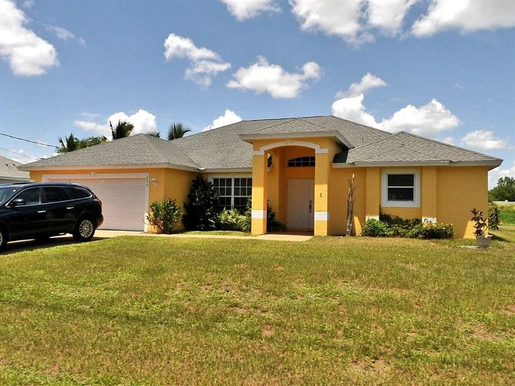 Photo of 273 SW Glenwood Drive, Port St Lucie, FL 34984 (MLS # R10828755)