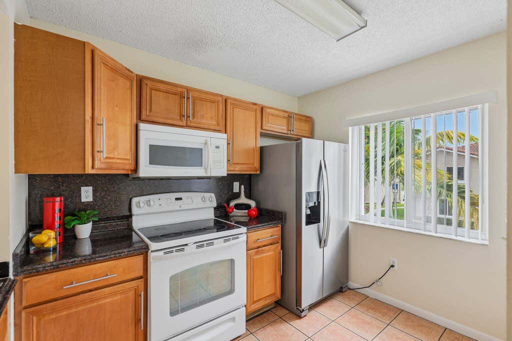 Photo of 167 RIVIERA Circle, Weston, FL 33326 (MLS # B26067301)