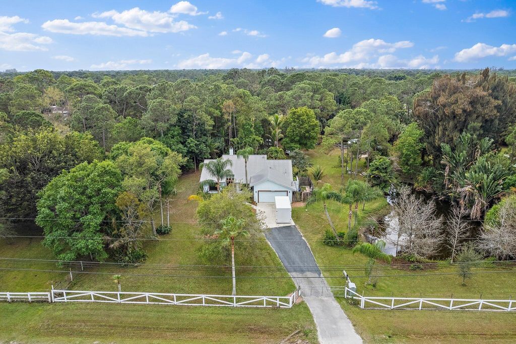 Photo of 12326 165th Road N, Jupiter, FL 33478 (MLS # R10869670)