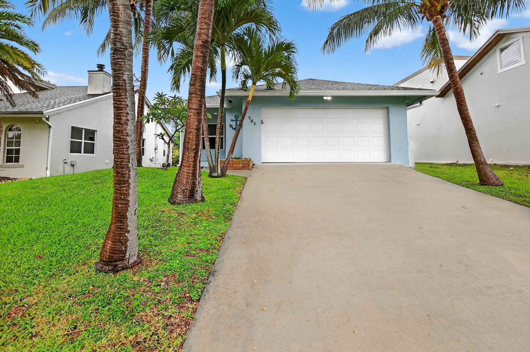 Nestled in the Intracoastal community of Mangrove Walk.. THis 3/2 with a 2 car garage is directly across from the Intracoastal... A short walk to waterfront dining and the beach. Home has been completely updated and features all hurricane impact windows and doors...Kitchen has all newer appliances, white shaker door cabinetry and quartz counters. bathrooms have both been recently redone and feature top of the line fixtures. porcelain tile in kitchen and vinyl wood look flooring in the rest of the home.. An amazing home in a great waterfront community..