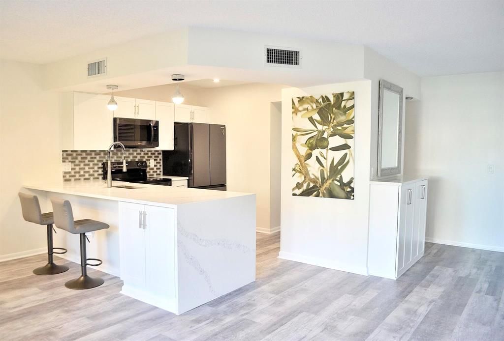 Photo of 1605 S Us Highway 1 #105v2, Jupiter, FL 33477 (MLS # R10762304)