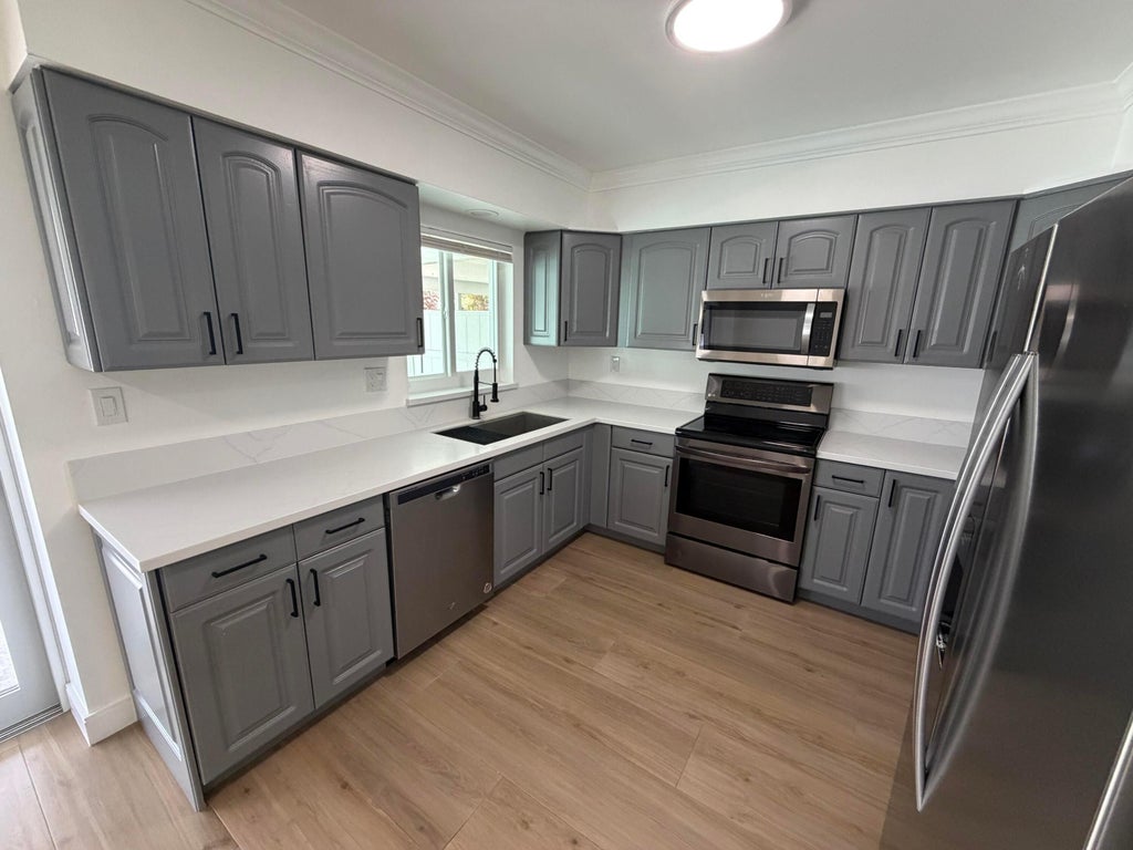 Photo of 498 W CONFERENCE Drive #N, Boca Raton, FL 33486 (MLS # B26060696)