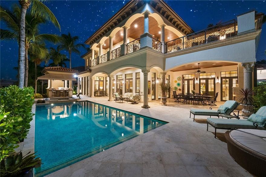 Seller financing available. This Mediterranean-inspired home epitomize luxurious waterfront living. This property features 5 BR and 5.5 BA. The master suite features a custom $80k mahogany closet, an ensuite with soaking tub, sauna and a separate laundry room. The kitchen is complete with Viking appliances, plus a coffee station and a large island. When it’s time to relax, there’s a sparkling pool and heated Jacuzzi, plus a summer kitchen. Extra features include 2 gas fireplaces, a 2nd-floor office, a wine cellar, an air-conditioned 3-car garage with room to convert it into a 6-car garage. With your own private dock, plus 100-feet of water frontage and no fixed bridges, powering out to the ocean is fast and easy. Over $1.7 million has been spent updating this home.