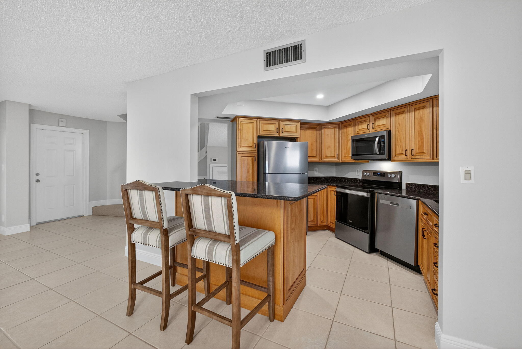 WALK TO THE BEACH ON A PRIVATE DEEDED WALKWAY.Lovely, Clean and Spacious (1,620 Sft)3Bedroom ,2Full Bath,1 Half Bath Condo/Town currently for SALE in the Seaside Community of Seabrook Place,Jupiter. Property RECENTLY went through RENOVATIONS ($35k). BRAND NEW Carpet(stairs and 2nd floor only) FULL BATHROOMS REMODELLED:NEW TILE,TUB ,SHOWER,CABINETS, FLOORS, FAUCETS. INTERIOR FRESHLY PAINTED .NEW RECESSED LIGHTING in Kitchen. NEWER SS Appliances(2025). WASHER/DRYER (2023). Newer light fixtures. A/C(2022). HURRICANE SHUTTERS throughout. Rarely available Most EASTERN Location of the Community, adjacent to a Peaceful Preserve. Seabrook is a GATED community,close to Shopping.As per the association:Basic Cable+one upgrade, 2 front assigned parking spots+Guests. RENTABLE AFTER PURCHASE.Pets ok.