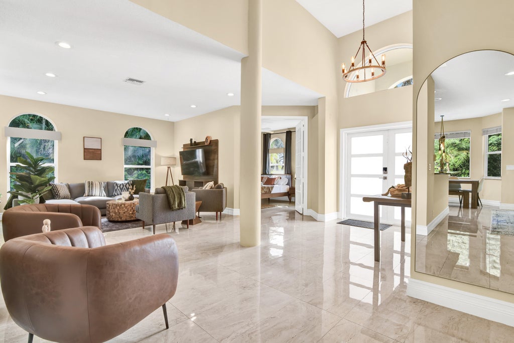 Photo of 1311 NW 2ND Circle, Boca Raton, FL 33432 (MLS # B26068145)