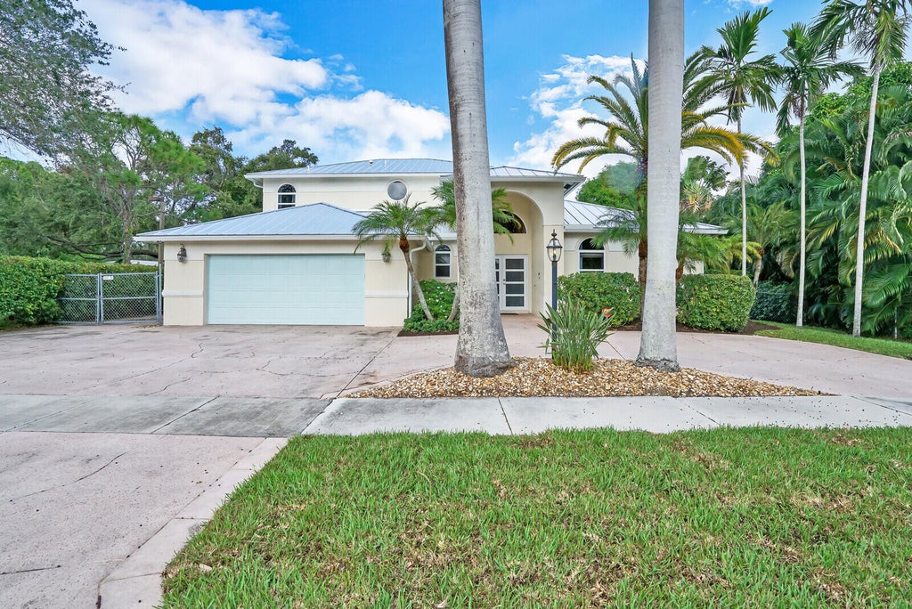 Photo of 1311 NW 2ND Circle, Boca Raton, FL 33432 (MLS # B26068145)