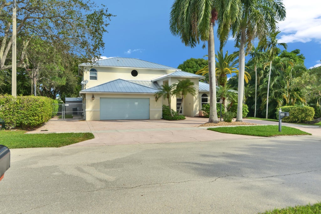 Photo of 1311 NW 2ND Circle, Boca Raton, FL 33432 (MLS # B26068145)