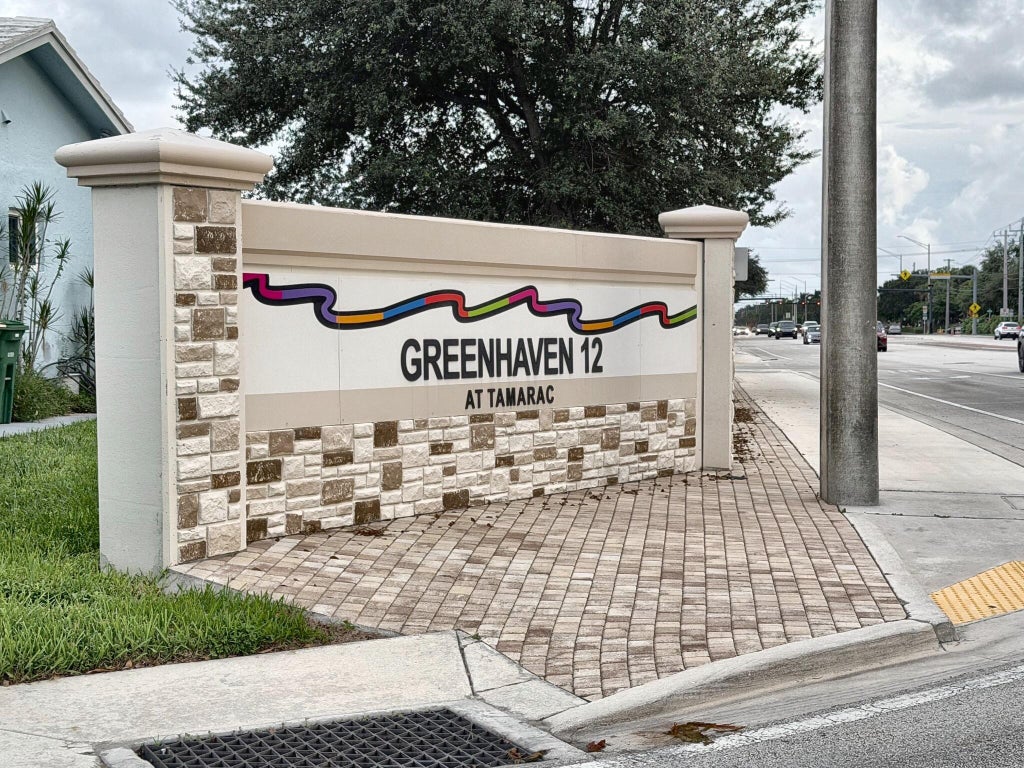 Photo of 5718 NW 86TH Terrace, Tamarac, FL 33321 (MLS # B26089380)