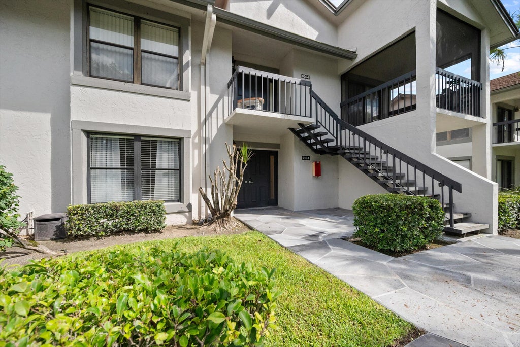 Photo of 11355 POND VIEW Drive #D104, Wellington, FL 33414 (MLS # B26053501)