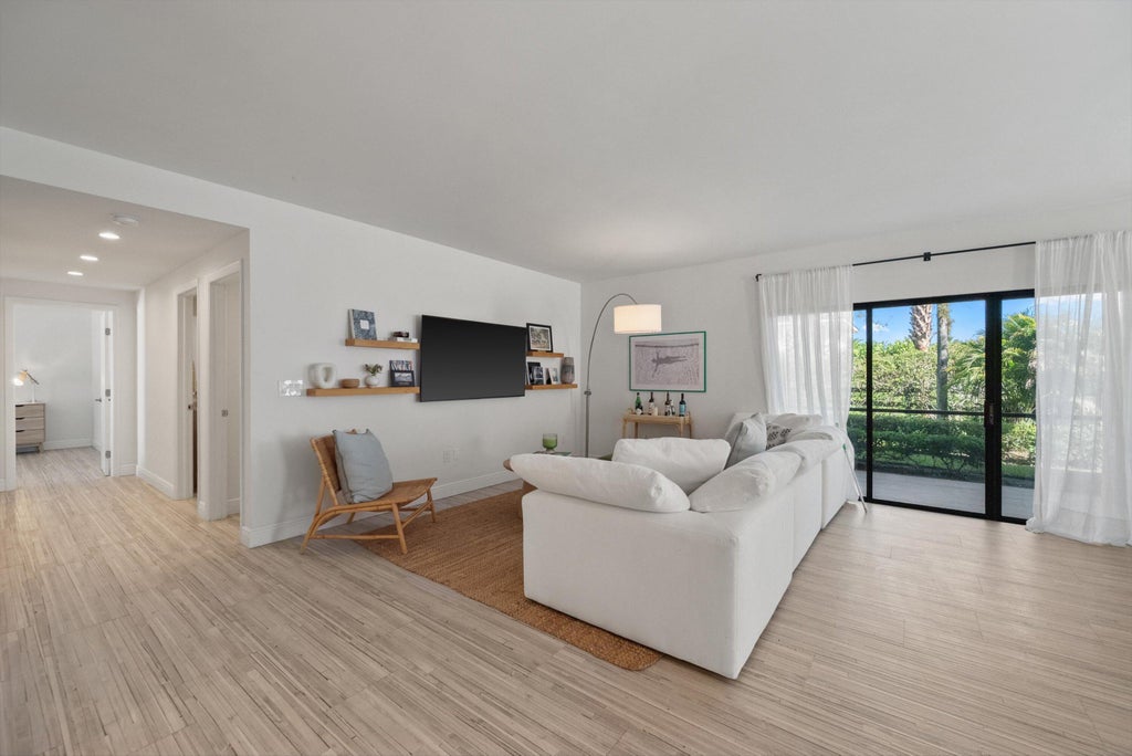 Photo of 11355 POND VIEW Drive #D104, Wellington, FL 33414 (MLS # B26053501)