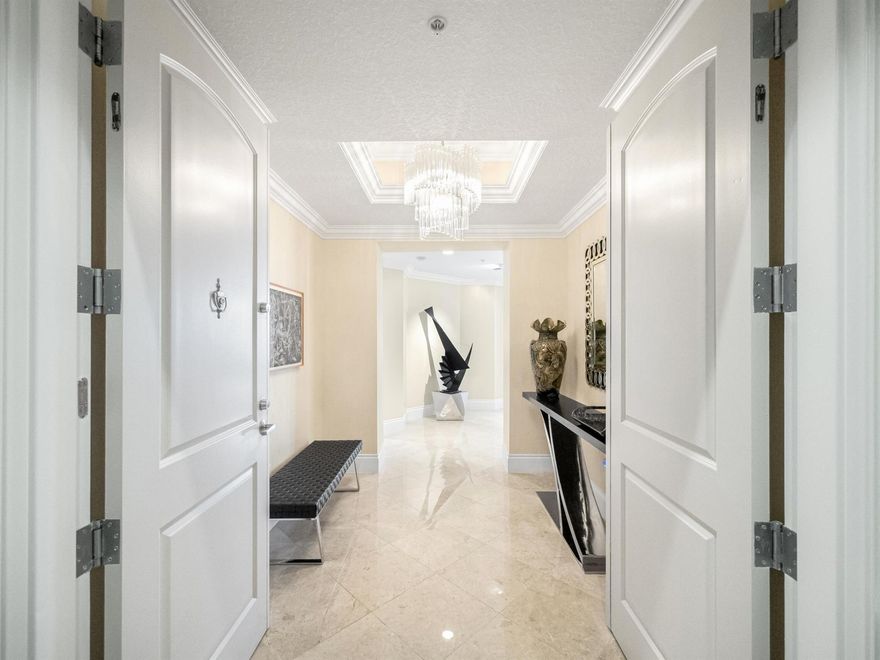 Step into the epitome of urban luxury living with this exquisite penthouse residence nestled in the coveted Two City Plaza. Boasting unparalleled elegance and panoramic views, this sophisticated residence offers a lifestyle of opulence in the heart of West Palm Beach.Upon entering, you're greeted by an elegant foyer that sets the tone for the grandeur that awaits. Adorned with expansive floor to ceiling sliding doors framing sweeping views of the intracoastal waterway, Atlantic Ocean and Palm Beach Island. Every corner of this residence is a masterpiece of design and comfort.Spanning nearly 3,800 living square feet, this meticulously crafted penthouse features an open plan layout seamlessly designed to connect the living, family, formal dining, kitchen and breakfast areas, providing the