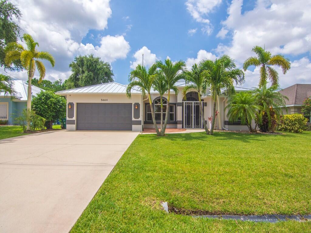 Beautifully updated CBS pool home located in the highly desirable Torino section of Port St. Lucie. This thoughtfully designed home offers a split floor plan with both a formal living area and a spacious family room, perfect for entertaining and everyday living. The gourmet kitchen is a showstopper with exotic quartzite countertops, a full matching quartzite backsplash, an oversized single granite composite sink, and luxury black SS appliances. Enjoy multiple dining spaces including a breakfast bar, kitchen nook, and formal dining area. The home features all-new waterproof luxury laminate flooring throughout. The guest and cabana bathrooms have been beautifully renovated with new 24x24 tile, soft-close vanities, updated light fixtures, and designer finishes.
