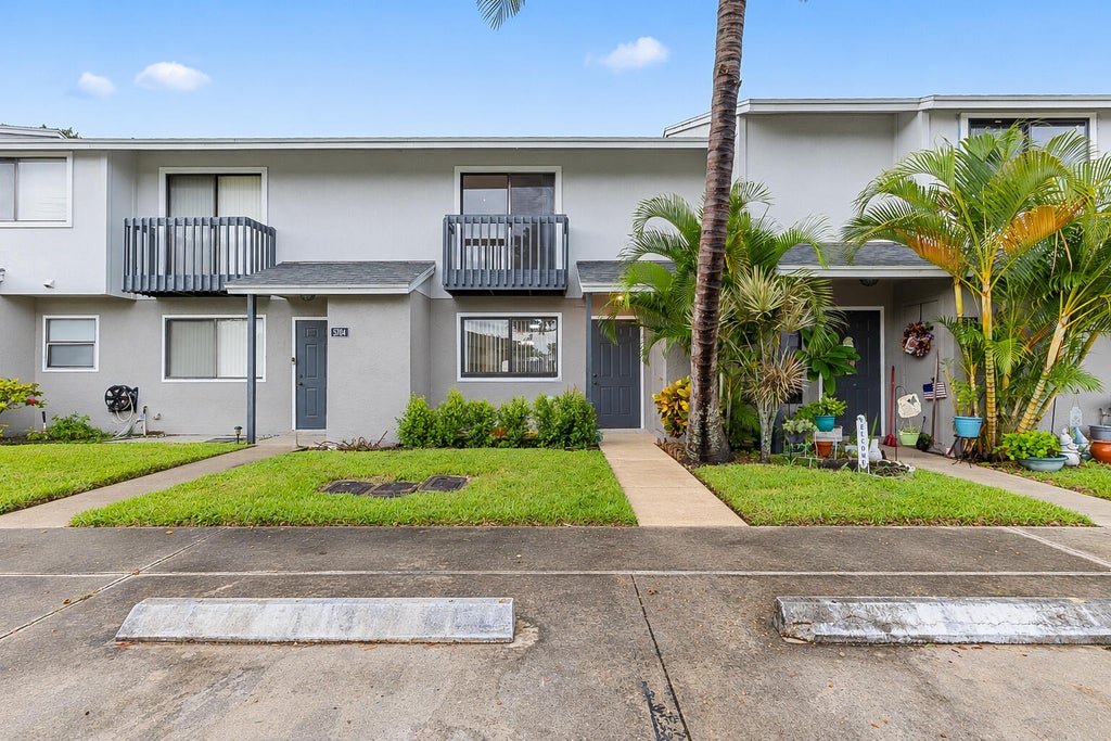 Photo of 5703 Channel Drive, Greenacres, FL 33463 (MLS # B26077232)