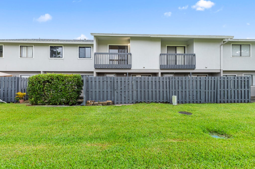 Photo of 5703 Channel Drive, Greenacres, FL 33463 (MLS # B26077232)