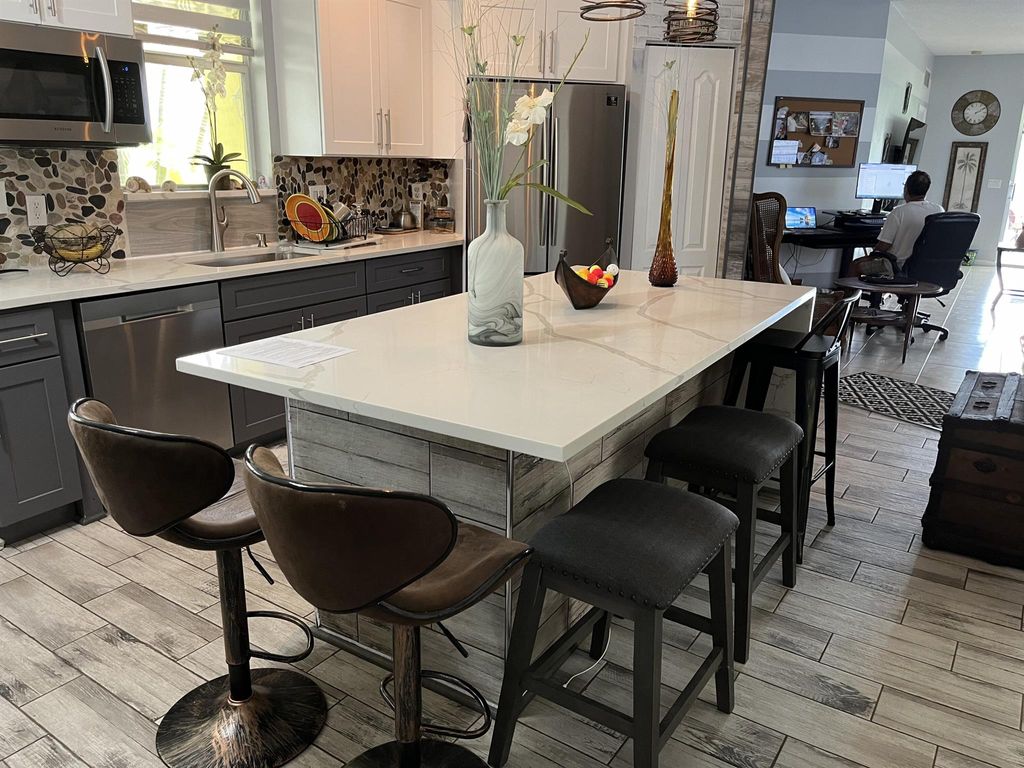 Photo of 9830 SW Eastbrook Circle, Port Saint Lucie, FL 34987 (MLS # R11003098)