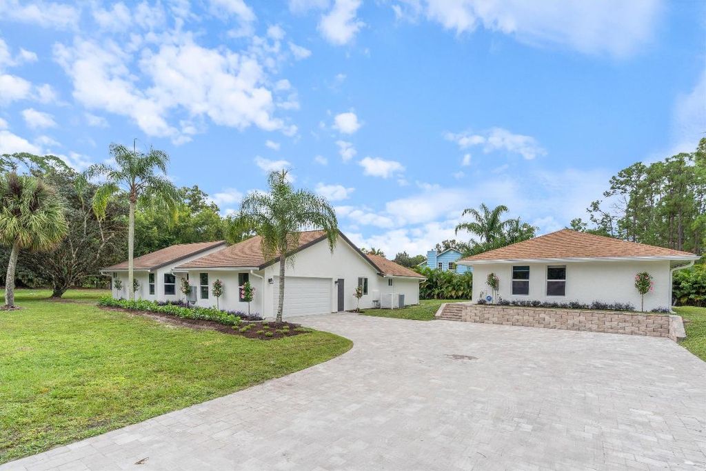 Photo of 12090 164th Court N, Jupiter, FL 33478 (MLS # R11138648)