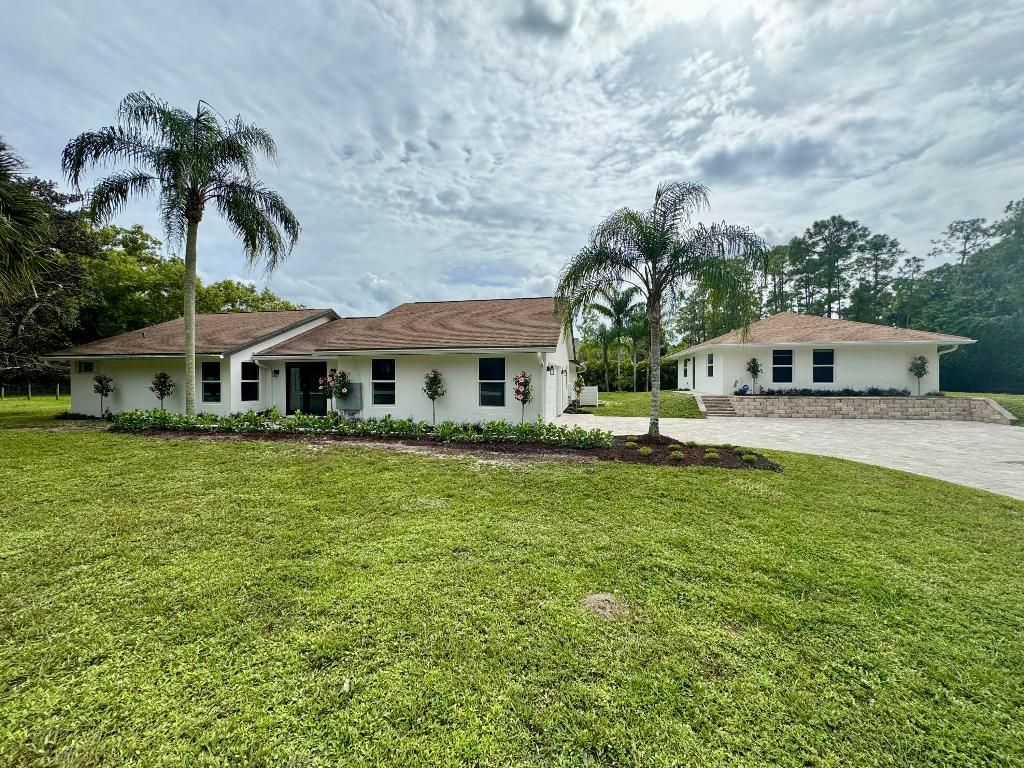 Photo of 12090 164th Court N, Jupiter, FL 33478 (MLS # R11138648)