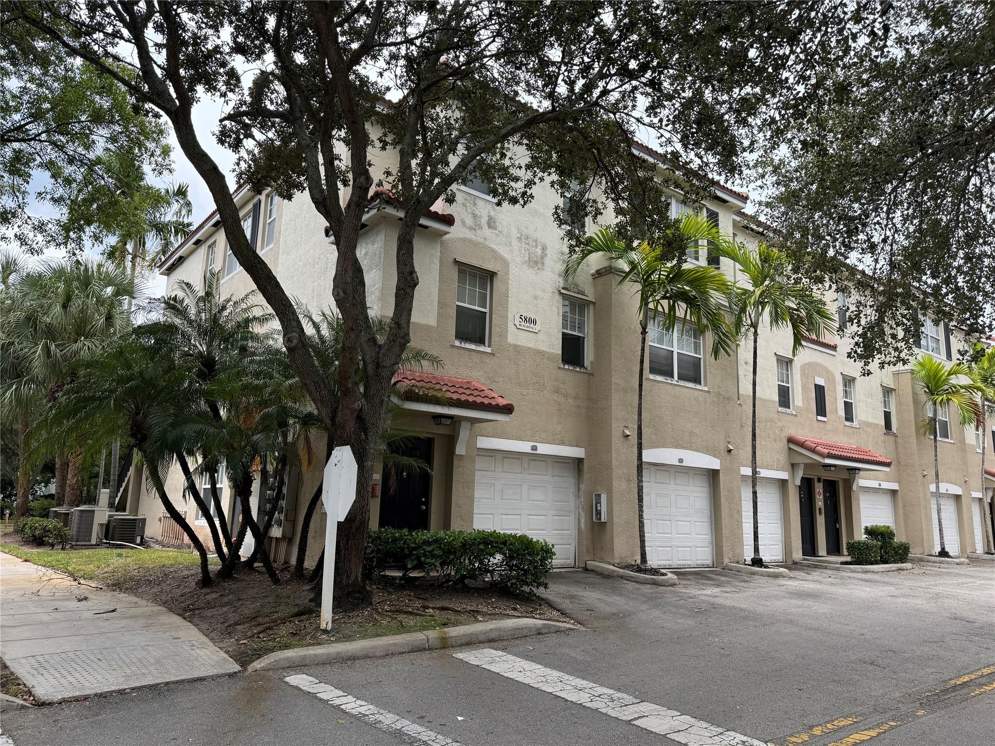 Rent this Townhouse-Style Condo. Spacious layout unit with wood floors, balcony with a pleasant street view . Located in a gated community with full amenities including clubhouse, pool, recreation areas and common spaces. Comfortable and secure living, close to restaurants, schools, shopping malls, movie theaters, and hospitals.