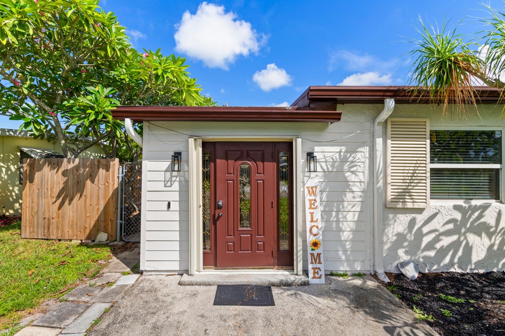Photo of 5581 CALICO Road, West Palm Beach, FL 33415 (MLS # B26072692)