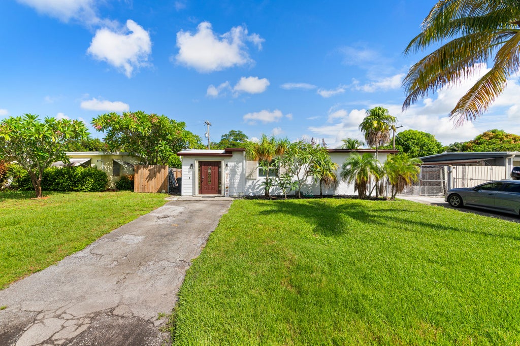 Photo of 5581 CALICO Road, West Palm Beach, FL 33415 (MLS # B26072692)