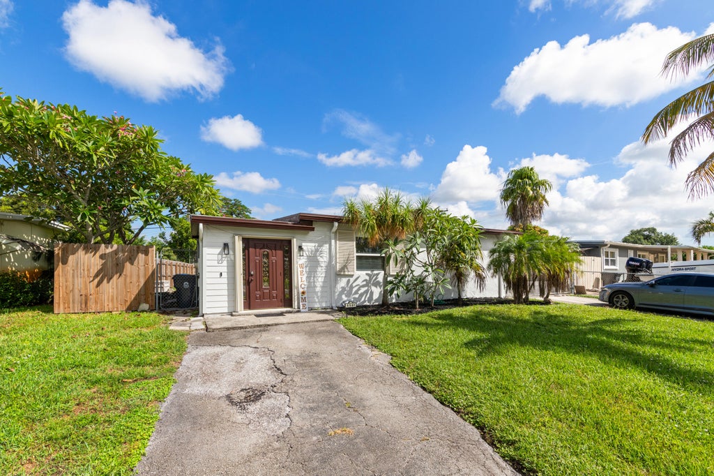 Photo of 5581 CALICO Road, West Palm Beach, FL 33415 (MLS # B26072692)