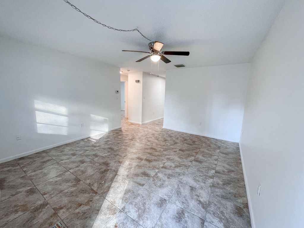 Photo of 122 Laidback Way, Fort Pierce, FL 34945 (MLS # R11159045)