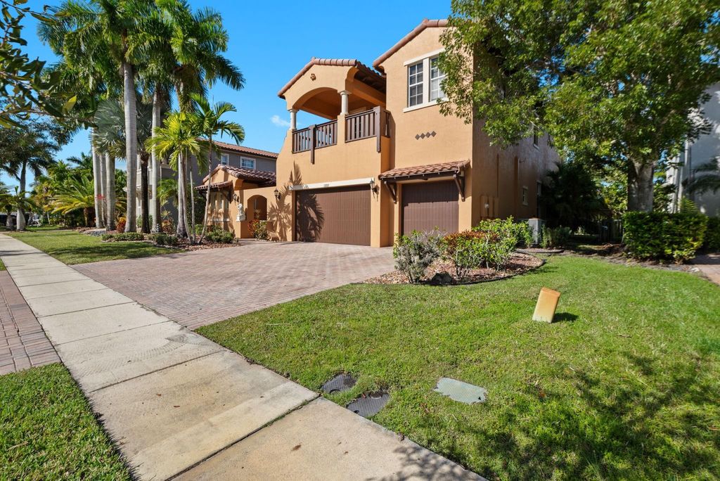 Photo of 12225 NW 71st Street, Parkland, FL 33076 (MLS # F10540470)