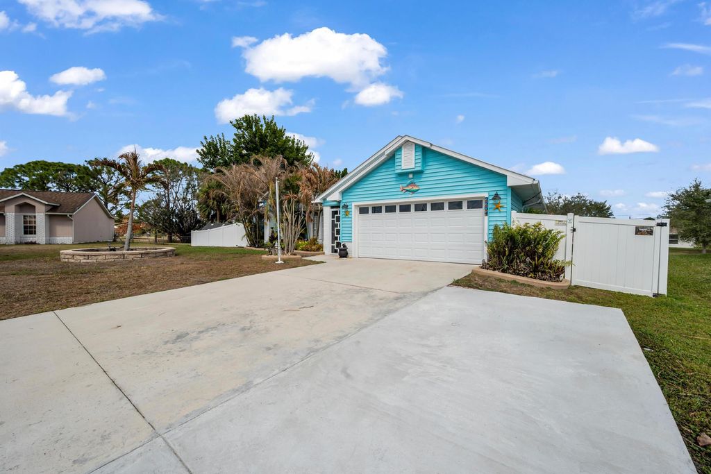Photo of 2201 SW Halissee Street, Port Saint Lucie, FL 34953 (MLS # R11168176)