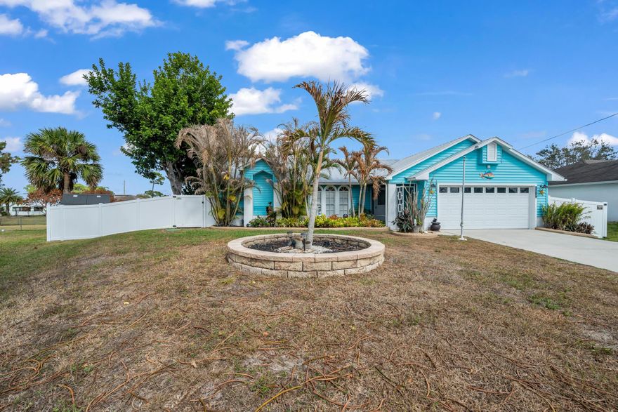 Beautifully maintained 3-bedroom, 2-bath pool home offering 1,594 living square feet in a prime Port St. Lucie location. Major upgrades provide peace of mind, including a 2015 metal roof, 2015 swimming pool with electric heater, 2017 5KW A/C system, and a 2022 solar system -- delivering energy efficiency and long-term savings. Previous bill just $60!

Interior features include updated flooring throughout, spacious living areas, an updated kitchen with modern backsplash, and upgraded bathrooms with glass door enclosures. Home is pre-wired for Vivint security system.

Situated on a desirable pie-shaped lot backing to a drainage canal for added privacy and extra yard space. The beautifully landscaped backyard and pool area create a private outdoor retreat ideal for entertaining or relaxin Conveniently located near I-95 and just minutes from shopping, dining, and community events in Tradition.