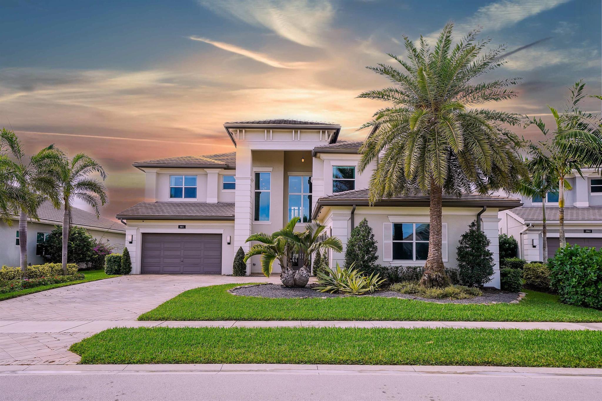 PRICE ADJUSTMENT. Welcome to luxury in this stunning & spacious 5800 sq. foot pool home on a lake on a quarter acre lot in an exclusive gated community of 56 homes. With 5 ensuite bedrooms, walk-in closets & 1 bd/1.5 baths downstairs the residence boasts over 200k in upgrades. The expansive living space blends sophistication & comfort, with a chef's kitchen equipped with top-of-the-line appliances,.. Custom electric curtains & blinds effortlessly enhance privacy. Upstairs is an open family room that leads to a lakeview veranda. The primary bedroom has 2 custom walk-in closets Practicality meets luxury with impact windows & a 2-zone air conditioning system. The convenience of a 4-car garage with epoxy floors adds a touch of practicality. A rated School zone. Walk to parks and recreation
