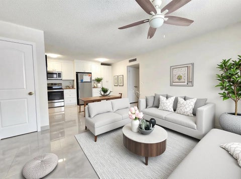 Photo of 651 Lyons Road #10107, Coconut Creek, FL 33063 (MLS # B26078987)