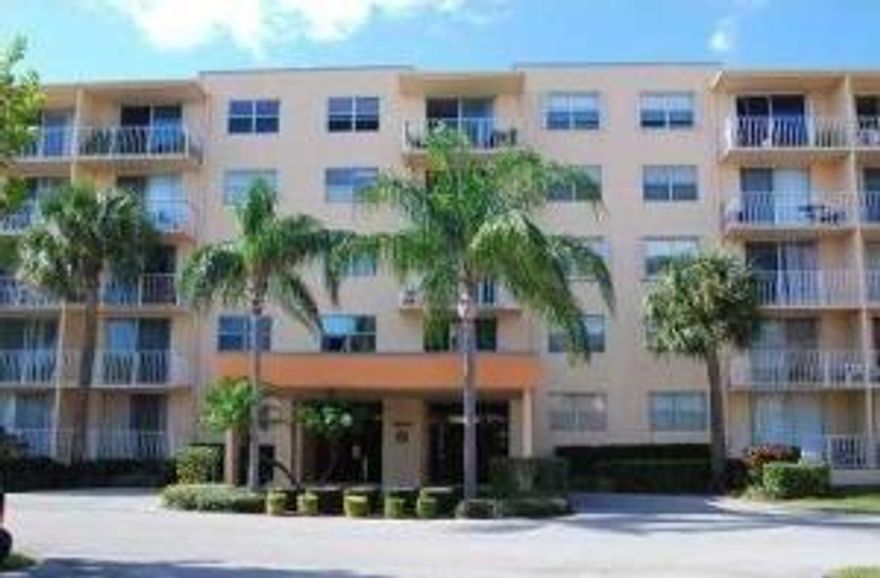 **Vacant and very easy to show!**  Beautiful 5th floor unit overlooking the city. Completely updated, tile in living areas, wood floors in bedrooms, crown molding through out, stainless steel appliances. Laundry room, and storage area on the same floor. Unfortunately no pets allowed for renters. Complimentary Car Wash Area. Olympic size pool, club house, fitness center. Gated community, and keyed entry to the building. Close to Palm Beach Outlets, the college, downtown, I-95 and the airport. Water and Basic Cable included.CONTRACT TO LEASE AND CONDO APPLICATION TO LEASE WITH TENANT REQUIREMENTS ARE ATTACHED.