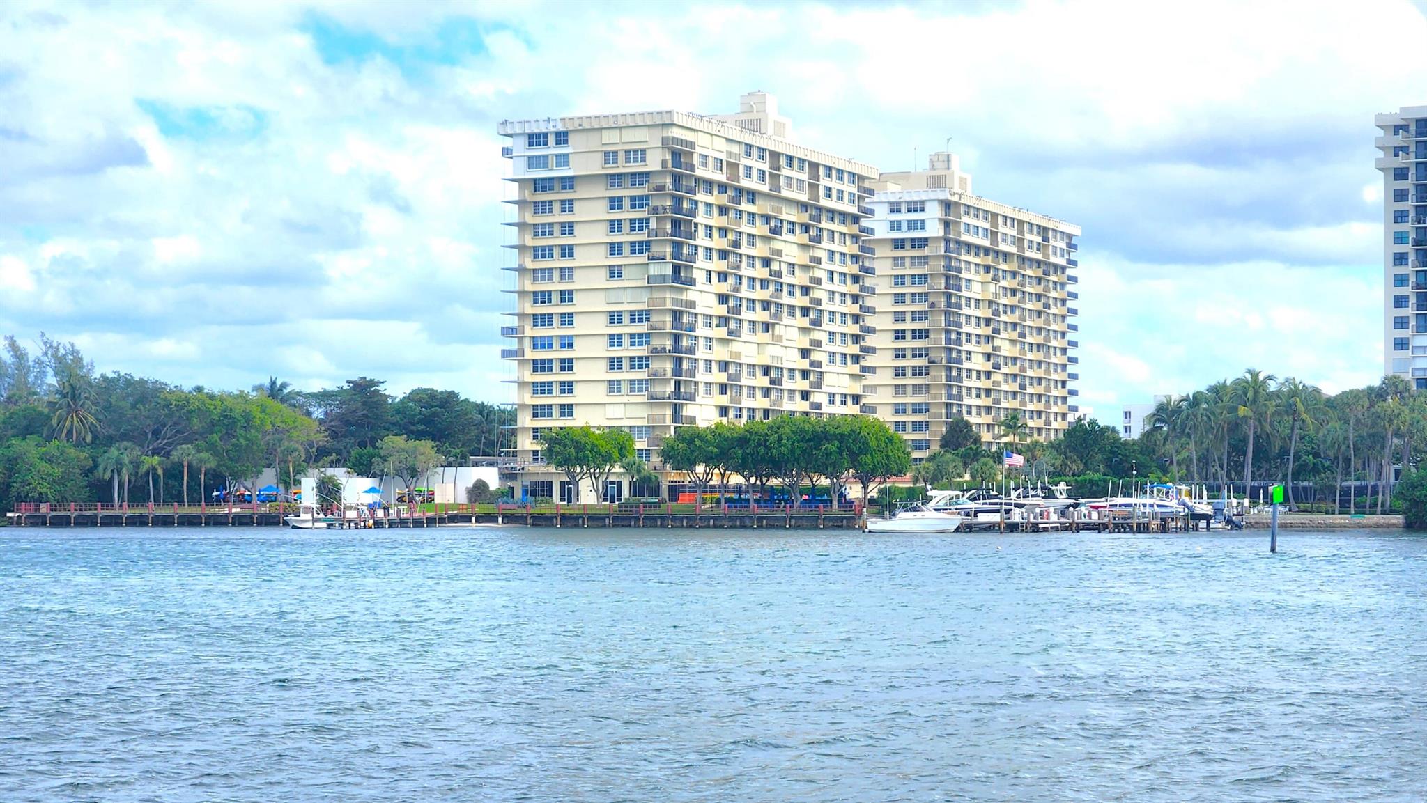 Awesome high floor furnished annual rental with panoramic ocean to intracoastal views from every window. SOuth Exposure, light and bright, private beach access, garage parking, 24 hr security, beautiful pool aread on Lake Wyman, community dock, bbq area, paddle board/kayak storage, clubhouse, fitness, sauna, billiards, library,... all within minutes from downtown and yet, you are surrounded by parks- Gumbo Limbo, Red Reef, OCean Strand and James A Rutherford Park. Superb location, great unit. 2nd bedroom is open to living room and has an accordion door for privacy. Rent includes water, cable and wifi, only pay for electric.