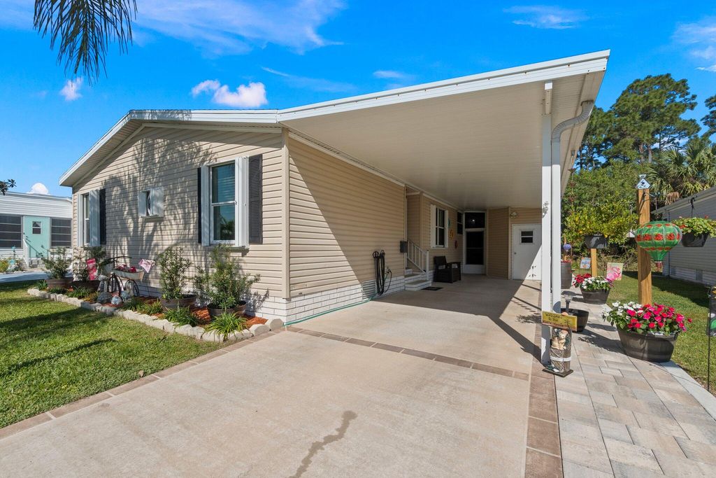 Photo of 352 Tropical Isles Circle, Fort Pierce, FL 34982 (MLS # R10956711)
