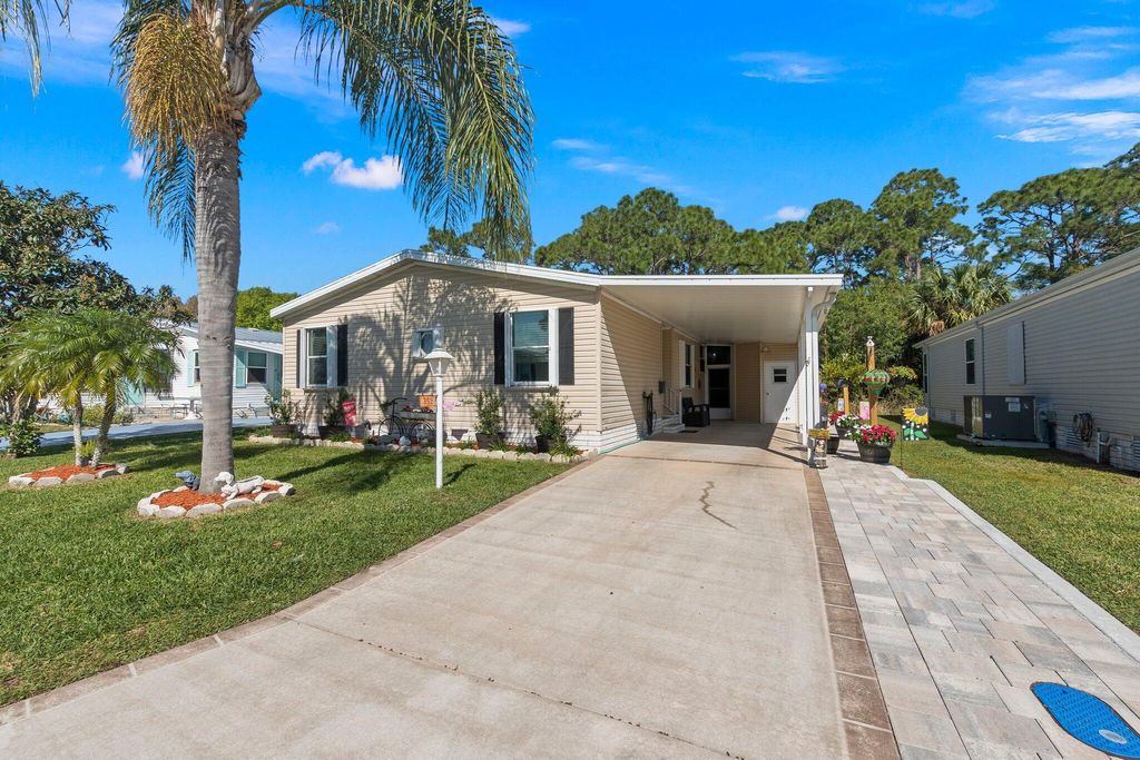 Photo of 352 Tropical Isles Circle, Fort Pierce, FL 34982 (MLS # R10956711)
